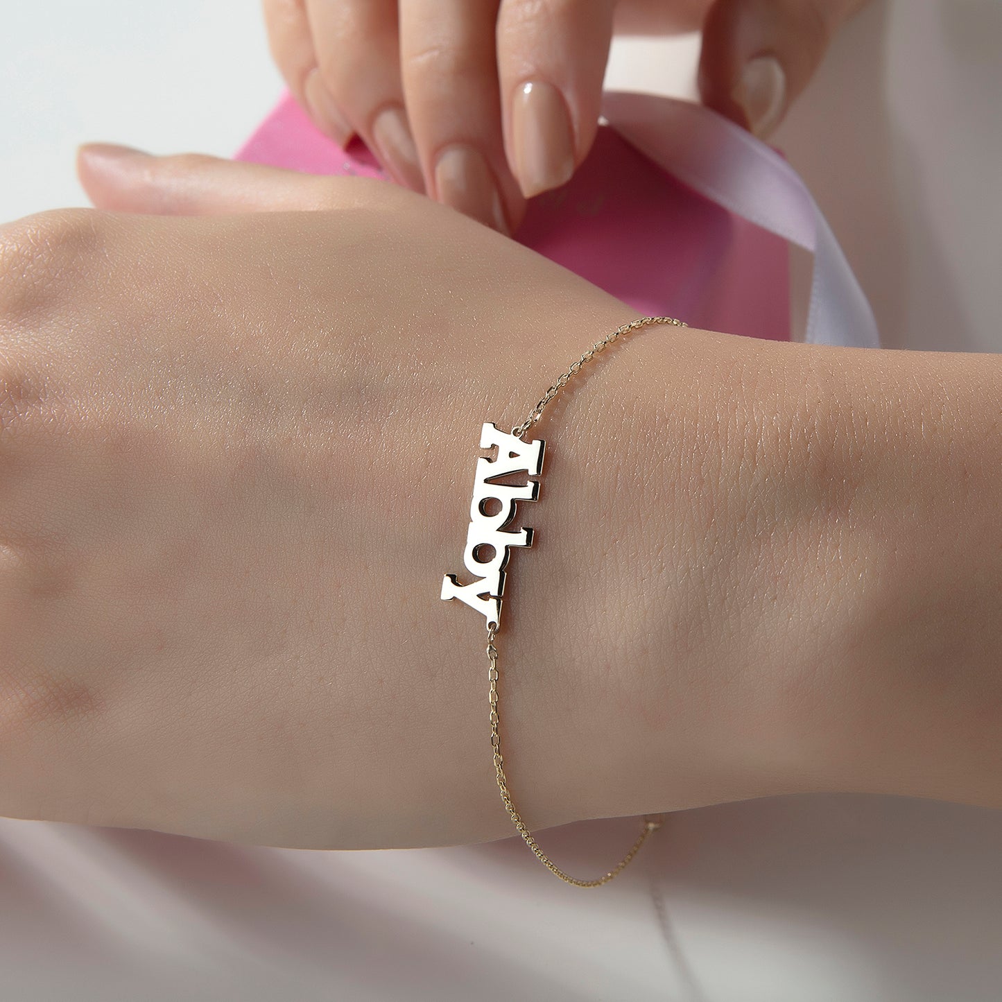 Namens Armband in Gold und Silber.